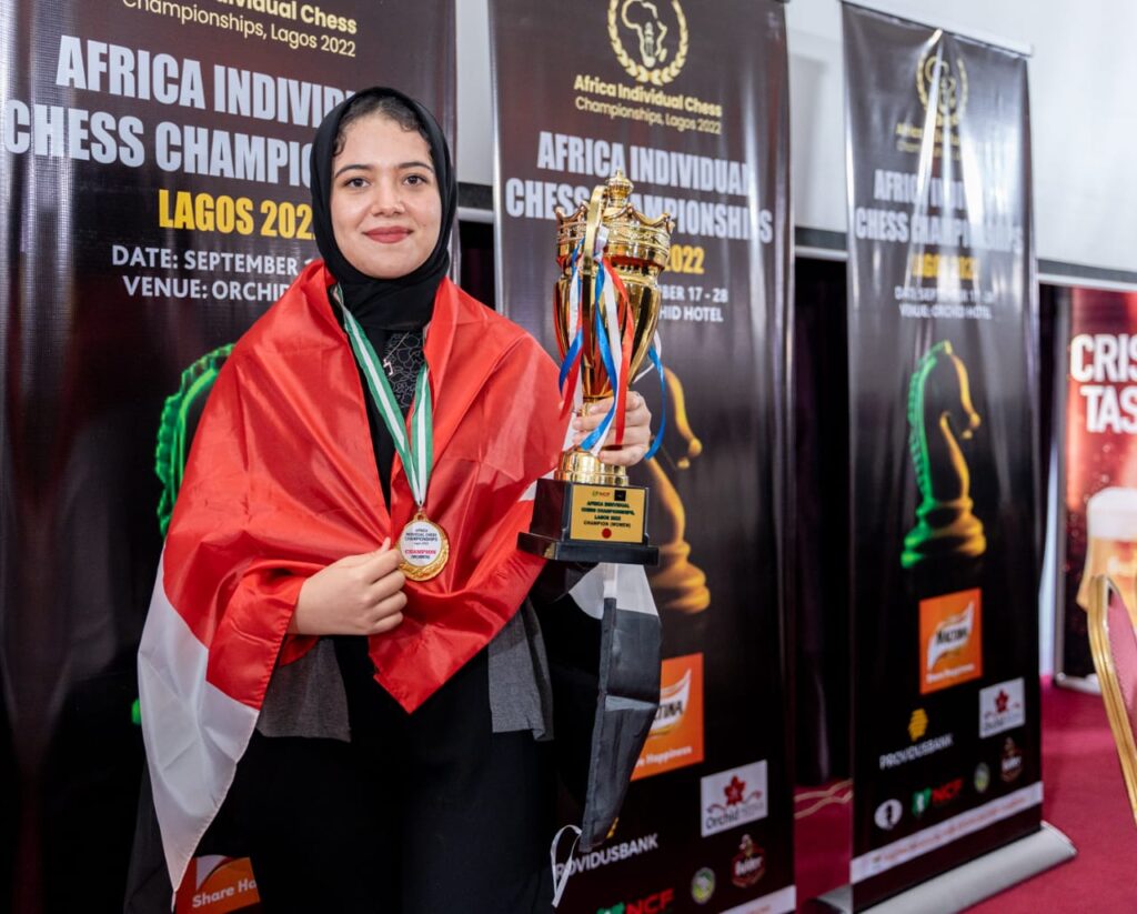 Shahenda Wafa poses with her championship medal and trophy, now her 3rd. 
All photos by Babatunde Ogunsiku (Africa Chess Media)